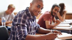 Cropped shot of a young college students in class